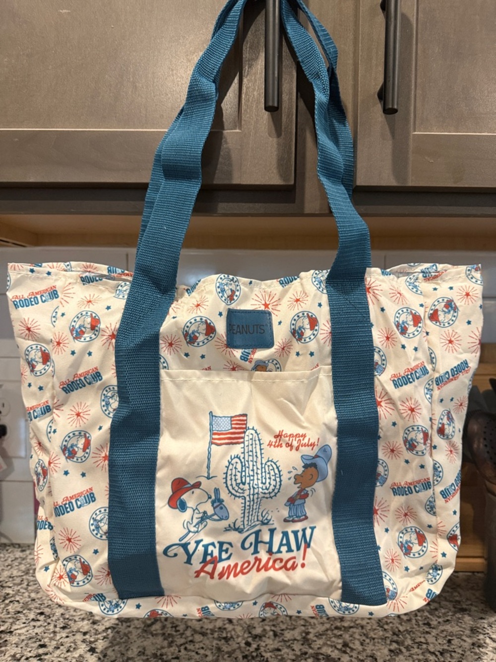 Peanuts Packable Cream Tote with Red and Blue Rodeo Motif - Picture 2 of 7